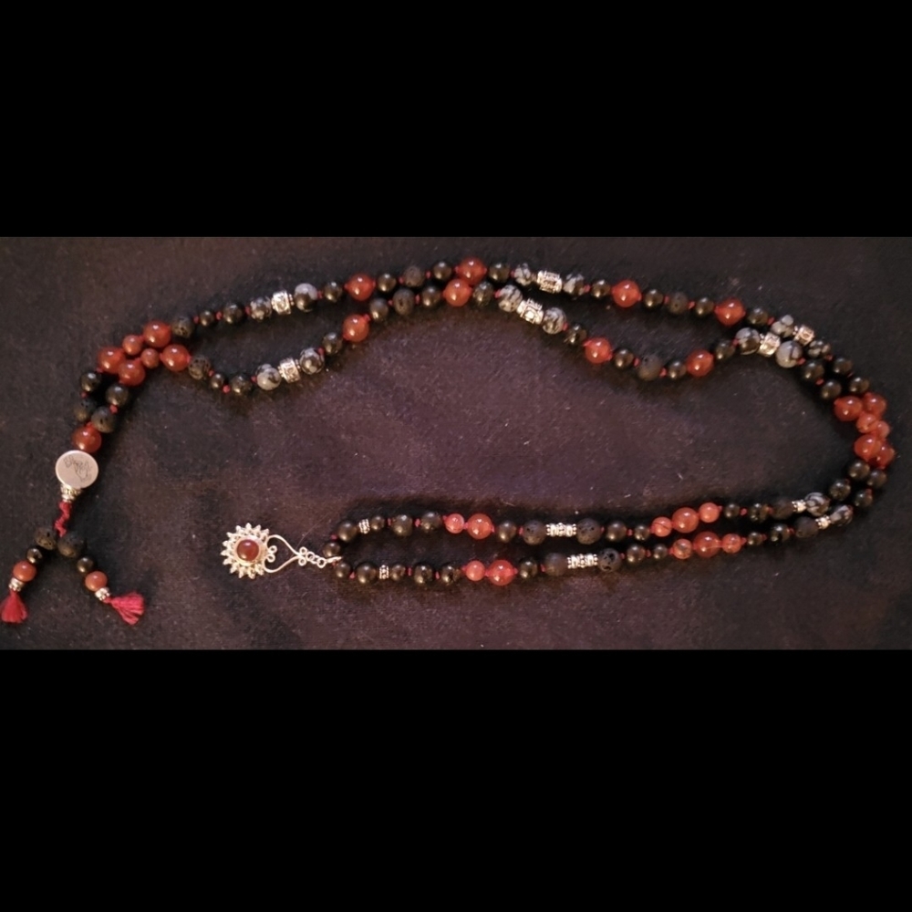 Hand-tied grounding mala
